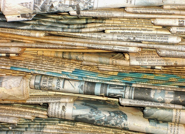 weathered stack of newspapers