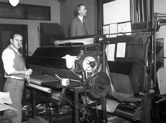 1930s printing press. Photo via the Seattle Municipal Archives.